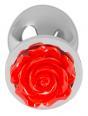 Plug in alluminio con rosa decorativa.