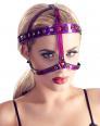 Imbracatura facciale color fucsia metallizzato con strass.