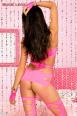 Music Legs: catsuit intagliata effetto reggicalze. Rosa neon