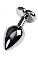 Plug in metallo con cristallo rosso.