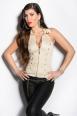 Top beige con zip e borchie dorate.