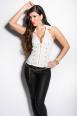 Top bianco con zip e borchie dorate.