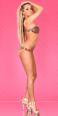 Monokini leopardato asimmetrico con catenelle e ciondoli.