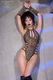 Body leopardato con stringhe regolabili e guanti.