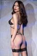 Completo intimo 2 pezzi in pizzo con giarrettiere incorporate. Nero