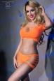 Top e shorts con intagli. Arancione