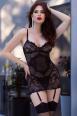 Chemise in pizzo e tulle con schiena scoperta e calze.