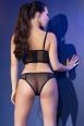 Top e slip in microrete e tessuto pitonato nero.