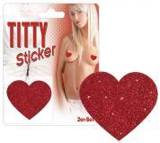 Copricapezzoli a cuore glitterati.