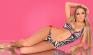 Monokini zebrato asimmetrico con catenelle e ciondoli.