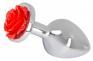 Plug in alluminio con rosa decorativa.